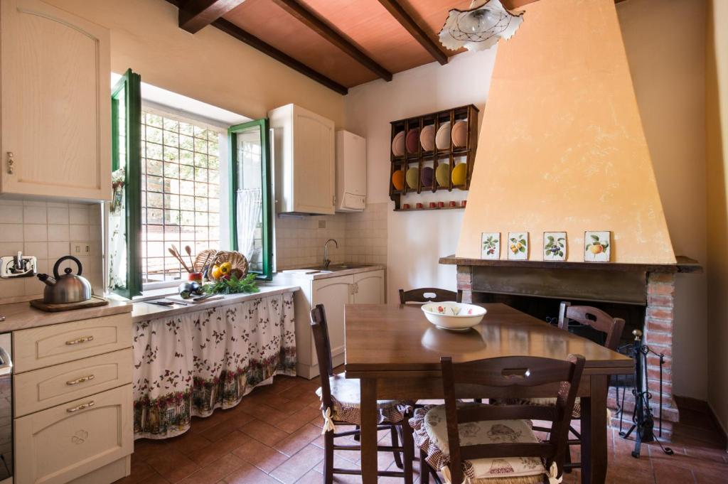 Kuchyň nebo kuchyňský kout v ubytování Agriresort & Spa Fattoria I Ricci