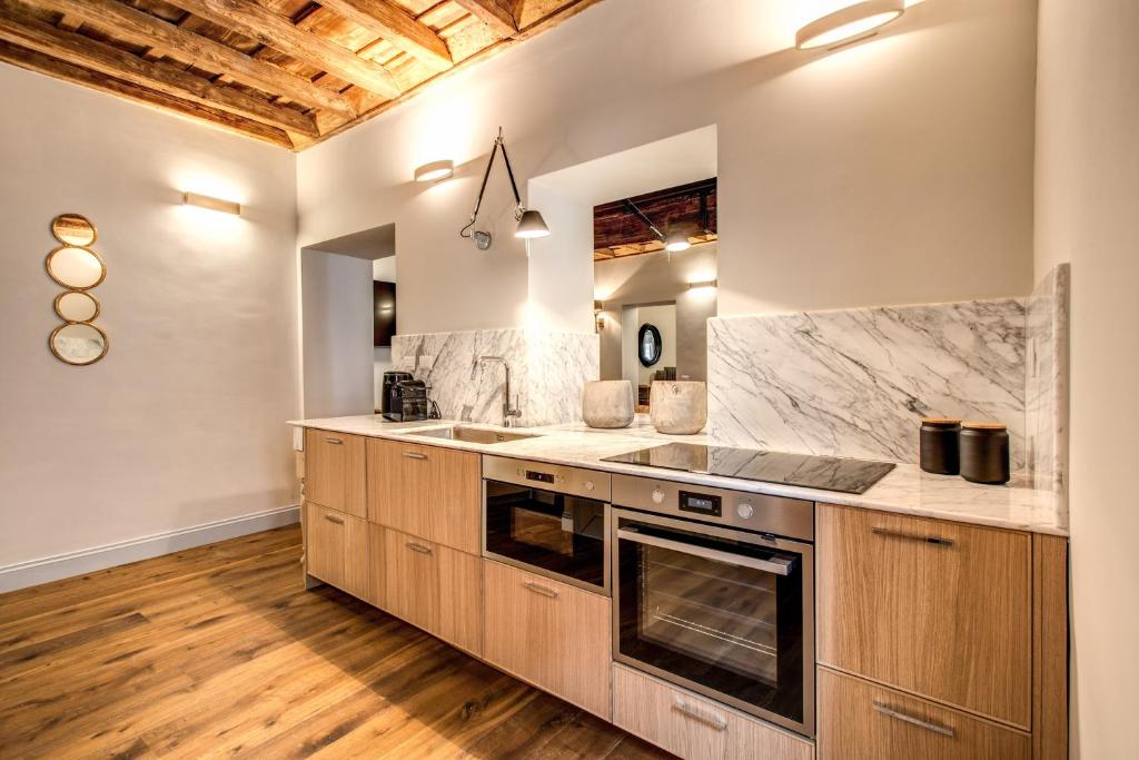 Kuchnia lub aneks kuchenny w obiekcie Febo Decharm apartment