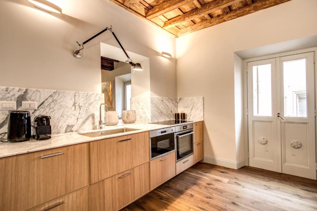 Kuchnia lub aneks kuchenny w obiekcie Febo Decharm apartment
