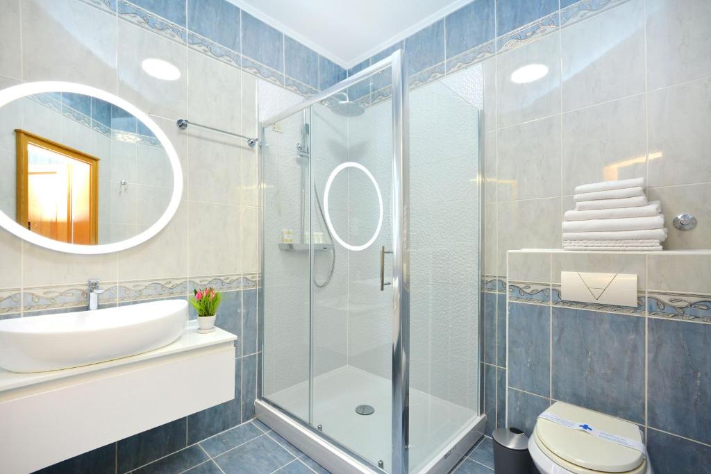 Koupelna v ubytování Hotel Adriana