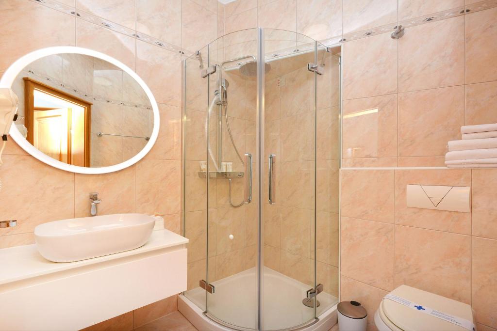 Koupelna v ubytování Hotel Adriana