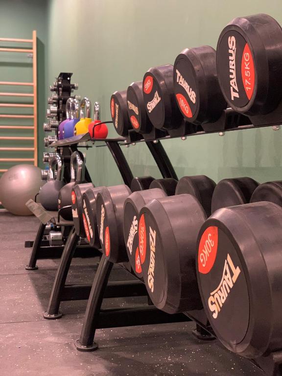 a row of dumbbells in a gym at Cabinn Copenhagen in Copenhagen