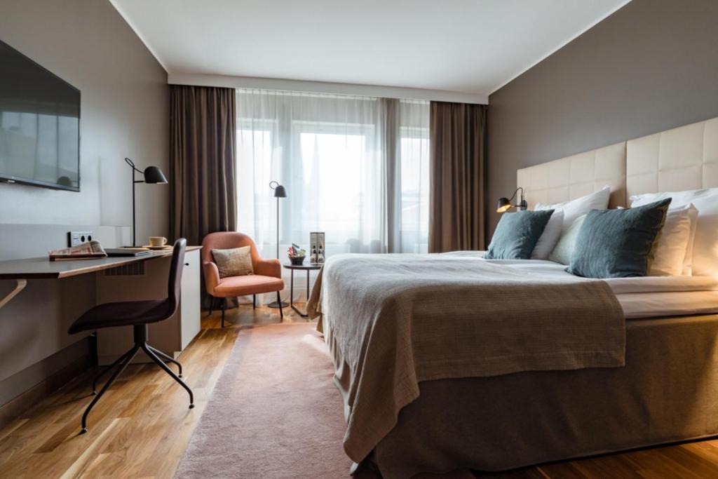 Postel nebo postele na pokoji v ubytování Clarion Hotel Gillet