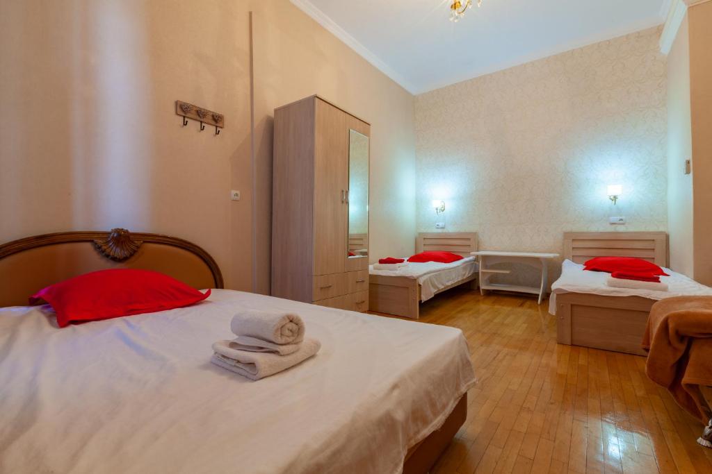 Postel nebo postele na pokoji v ubytování Guest House Keria