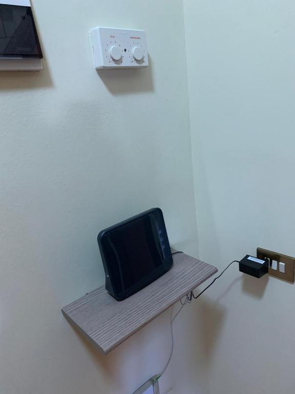 Telewizja i/lub zestaw kina domowego w obiekcie Bicocca Flat A