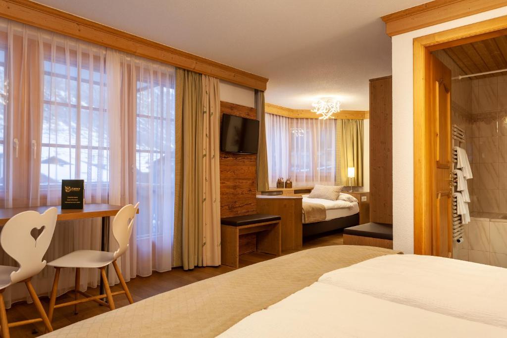 Ein Bett oder Betten in einem Zimmer der Unterkunft Hotel Jägerhof
