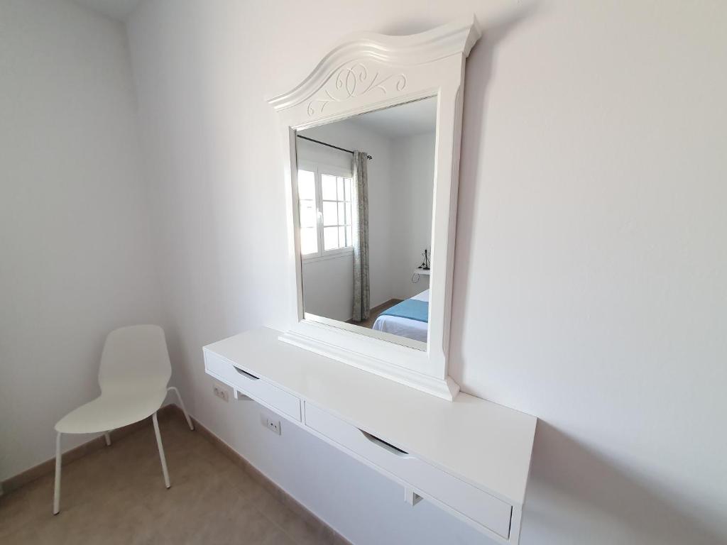 Postel nebo postele na pokoji v ubytování Apartamentos Graciosamar