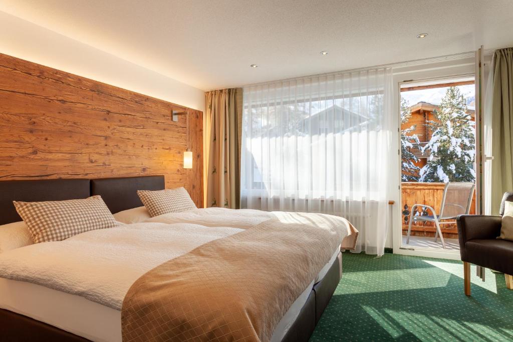 Postel nebo postele na pokoji v ubytování Hotel Jägerhof