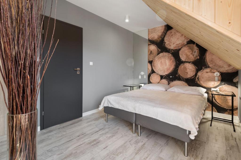 Posteľ alebo postele v izbe v ubytovaní Apartament Widok
