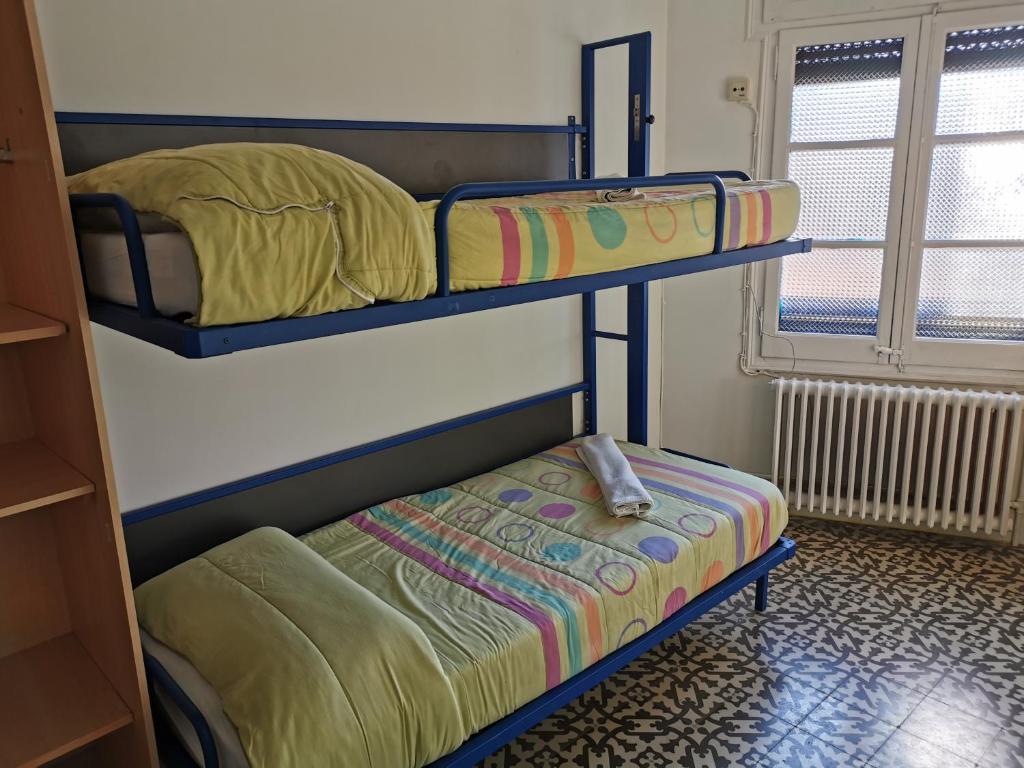 Postel nebo postele na pokoji v ubytování Alberg SPRINT