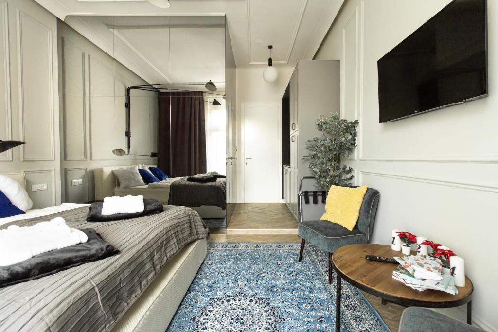 Televízia a/alebo spoločenská miestnosť v ubytovaní Tesla Design Apartments Zagreb