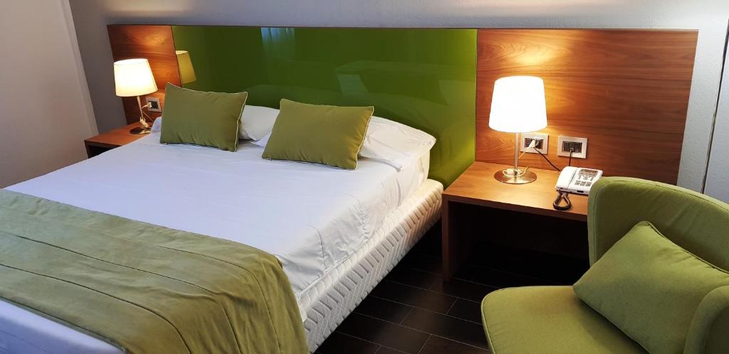 Postel nebo postele na pokoji v ubytování Hotel Sandalia