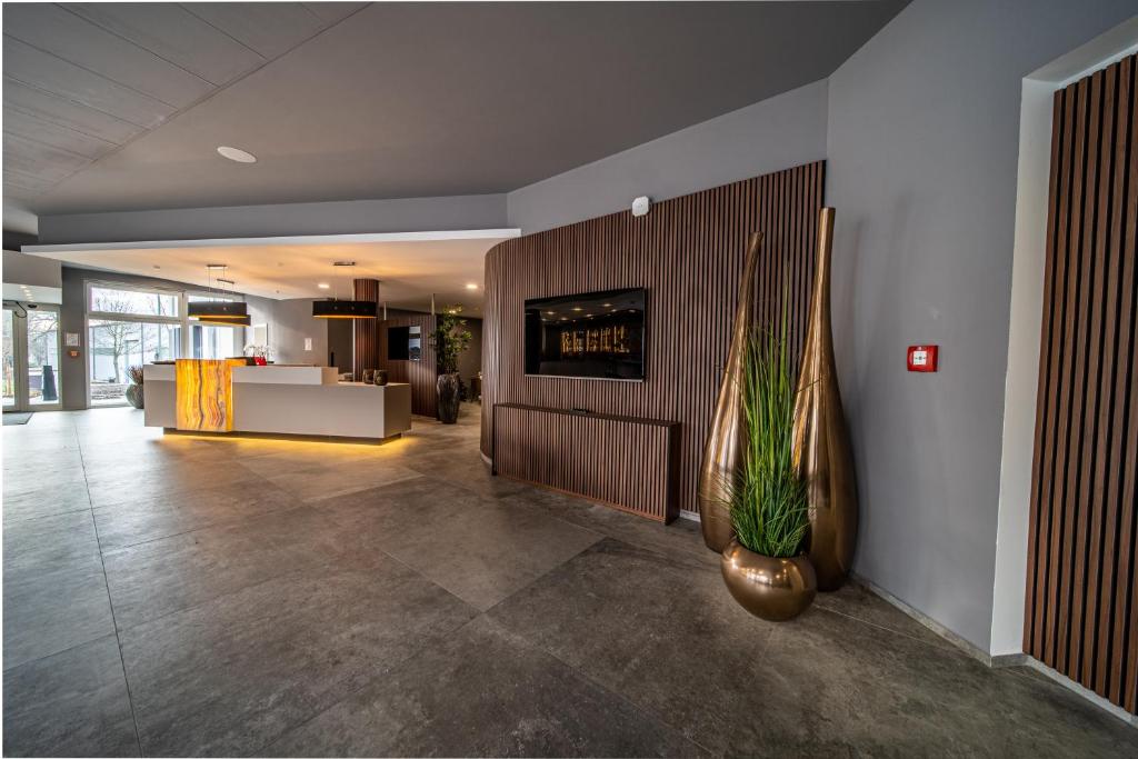 Vstupní hala nebo recepce v ubytování EE Hotel