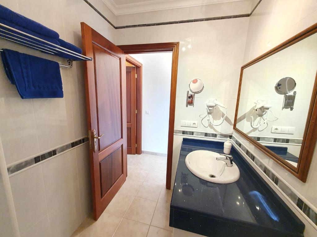 Koupelna v ubytování Apartamentos Graciosamar