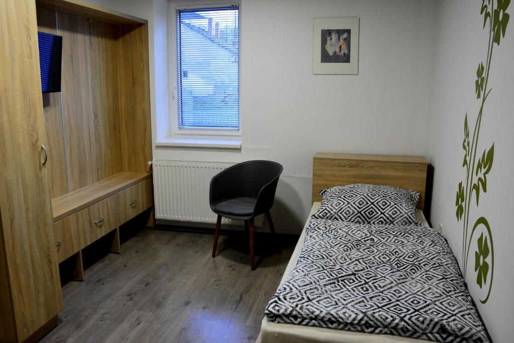 Łóżko lub łóżka w pokoju w obiekcie Dentissimi vendégszobák