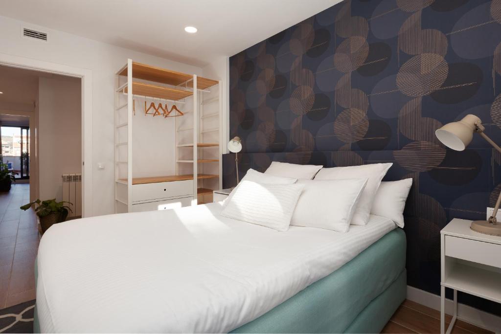 Postel nebo postele na pokoji v ubytování Mediterranean Barcelona Apartments