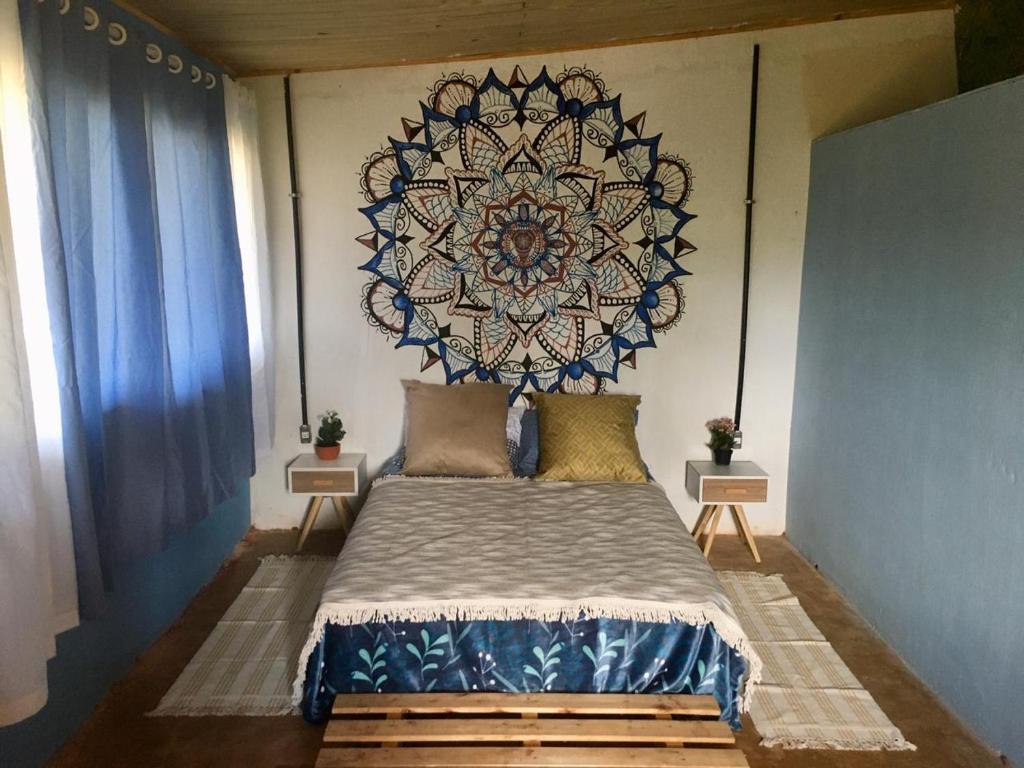 Säng eller sängar i ett rum på Vila da Mata - Bambu House