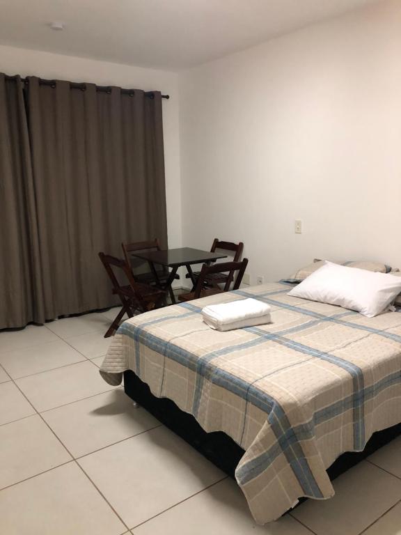 Postel nebo postele na pokoji v ubytování Kitnet 1 mobiliada no centro de Torres a 600m da Praia Grande