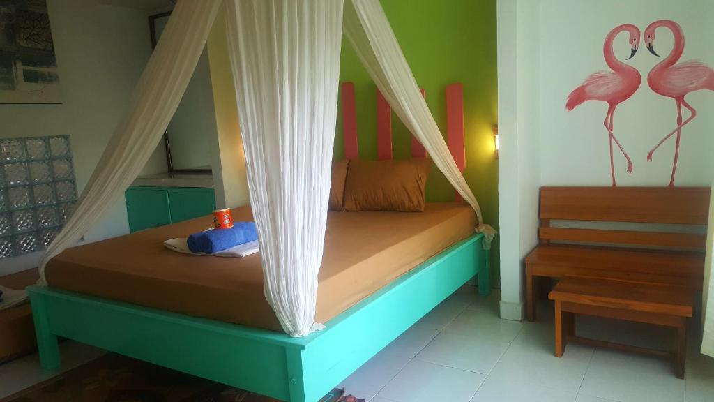 Cama o camas de una habitación en Tedi Bungalow
