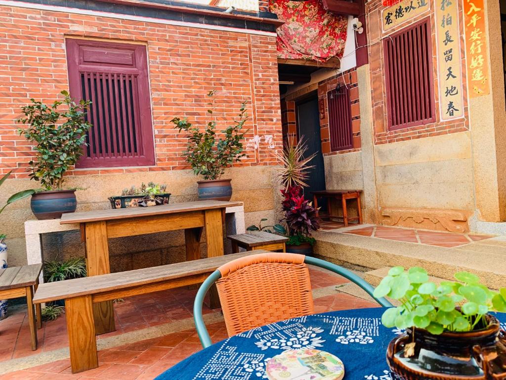 Patio nebo venkovní prostory v ubytování XQ B&B