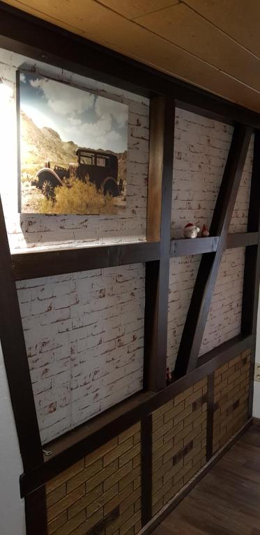 a wall with two pictures of a truck on it at Apartment nahe Erfurt in Gebesee