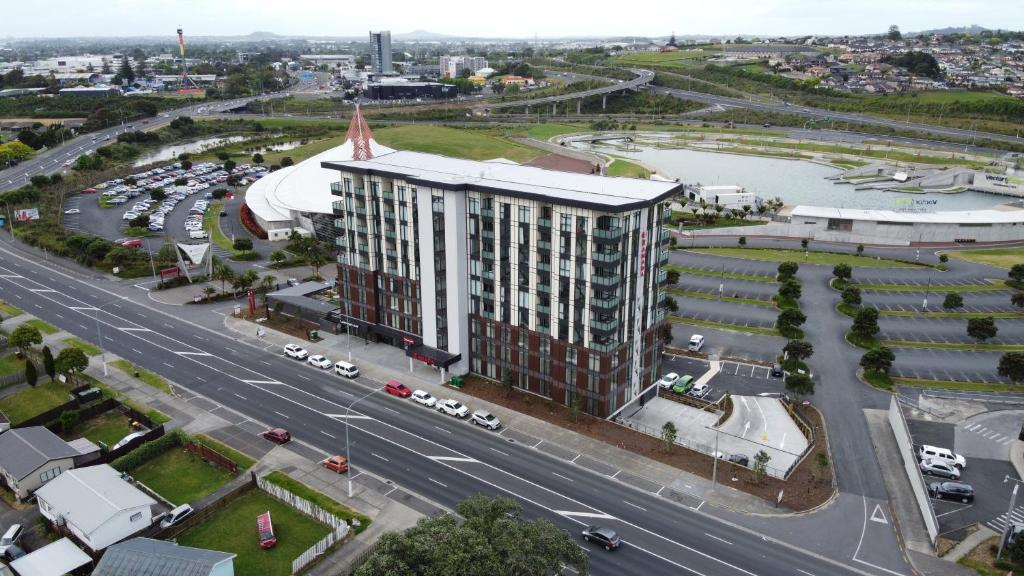 a large building with a large clock tower at Ramada Suites by Wyndham Manukau in Auckland