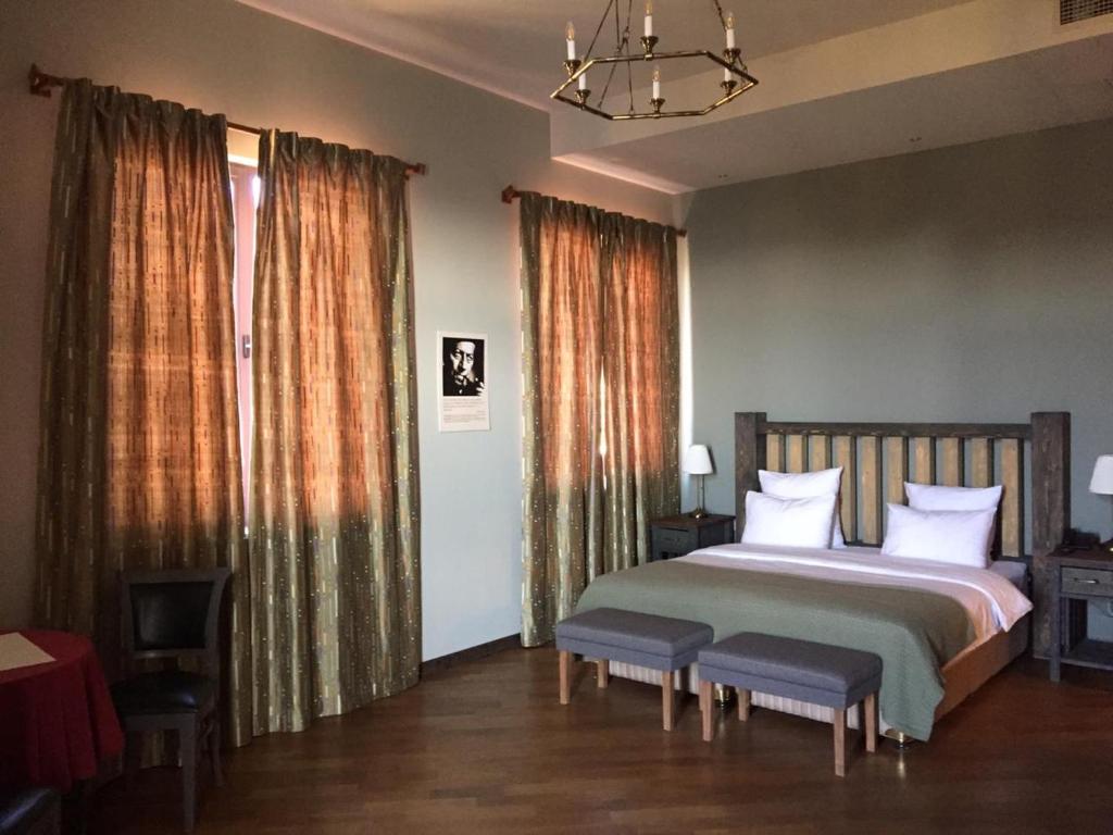 Postel nebo postele na pokoji v ubytování Apricot Hotel Yerevan
