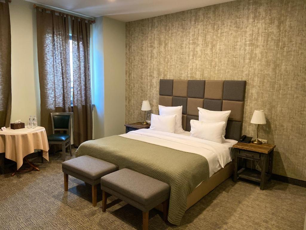 Postel nebo postele na pokoji v ubytování Apricot Hotel Yerevan