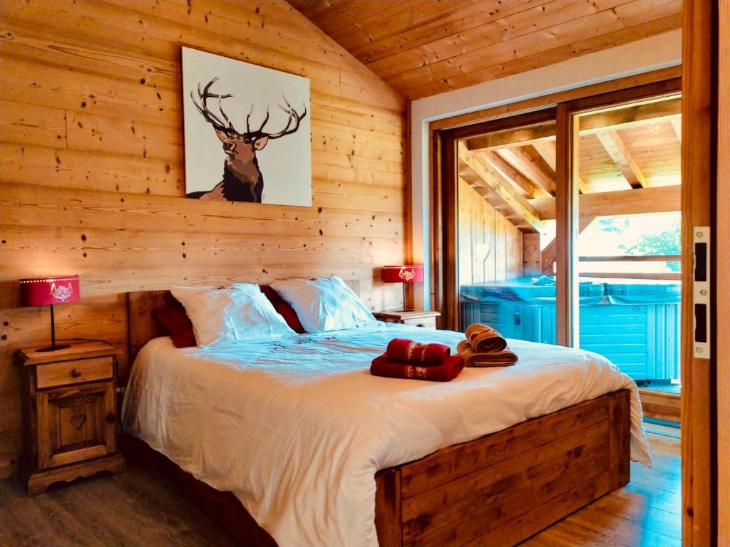 Katil atau katil-katil dalam bilik di Le Chalet Du Pic SPA privé & Fitness