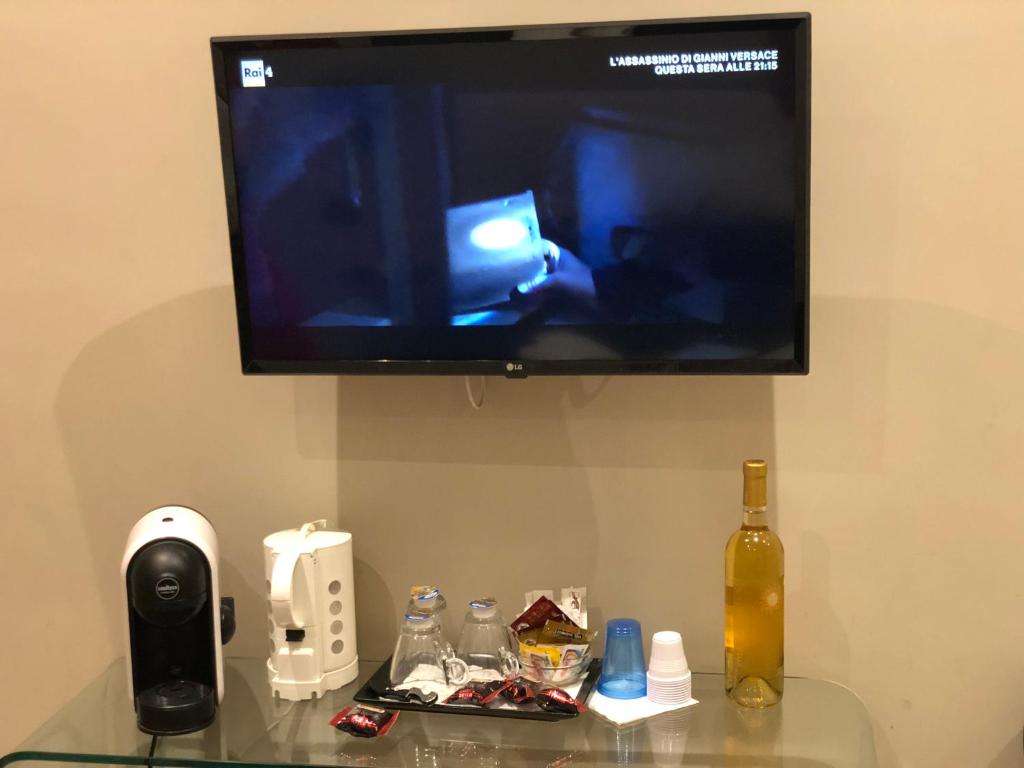 Telewizja i/lub zestaw kina domowego w obiekcie Trevi Portrait