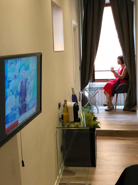 Telewizja i/lub zestaw kina domowego w obiekcie Trevi Portrait