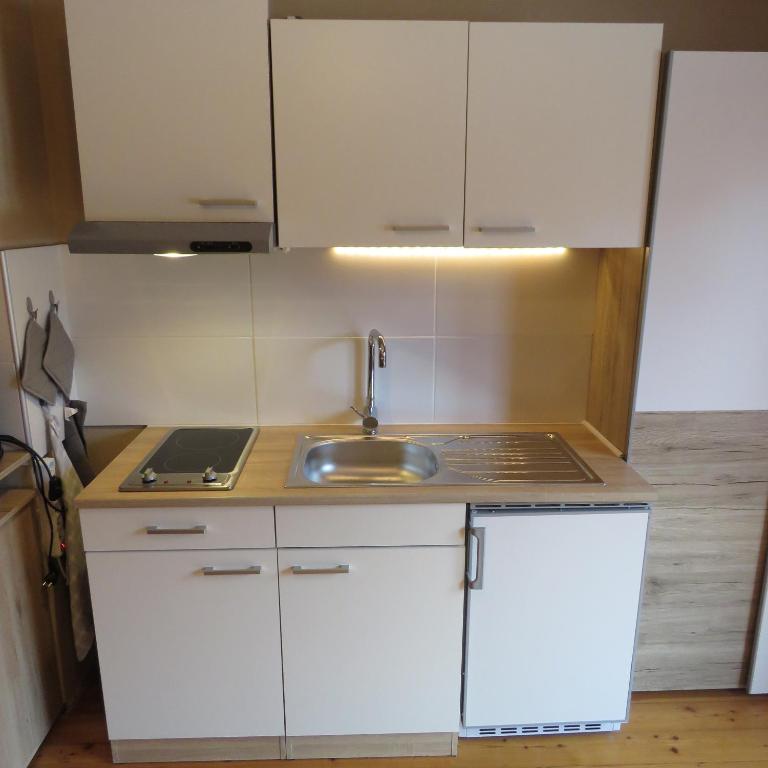 Kuchyň nebo kuchyňský kout v ubytování Haus Bergblick