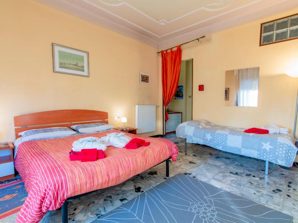 Posteľ alebo postele v izbe v ubytovaní Il Broletto B&B