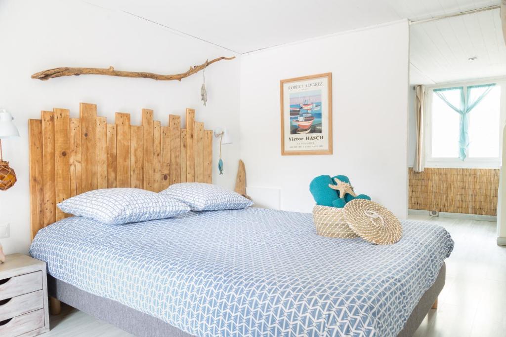 Postel nebo postele na pokoji v ubytování Maison d'hôtes L'îlot bambou