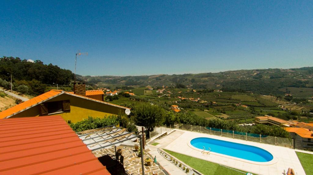 an aerial view of a villa with a swimming pool at King's House Douro Valley in Sedielos
