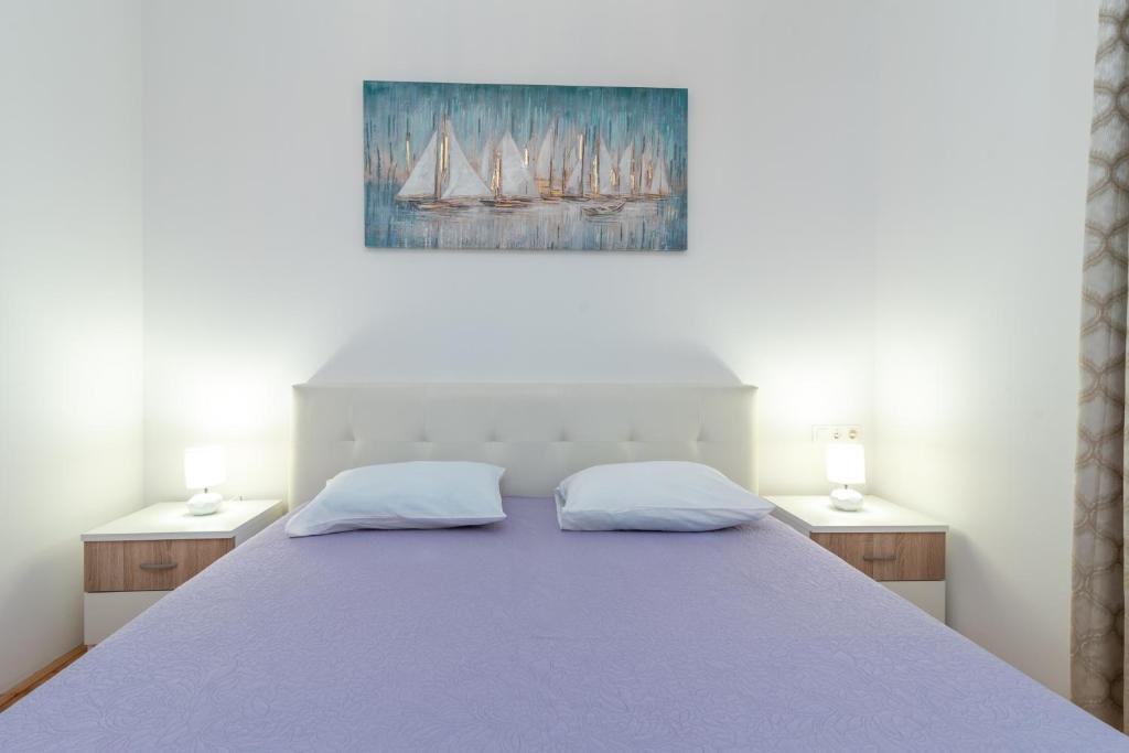 Posteľ alebo postele v izbe v ubytovaní Apartman Paty&Inky