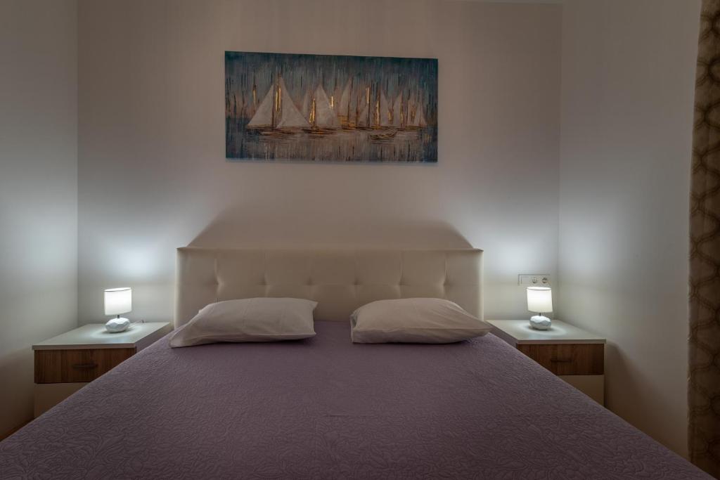 Posteľ alebo postele v izbe v ubytovaní Apartman Paty&Inky