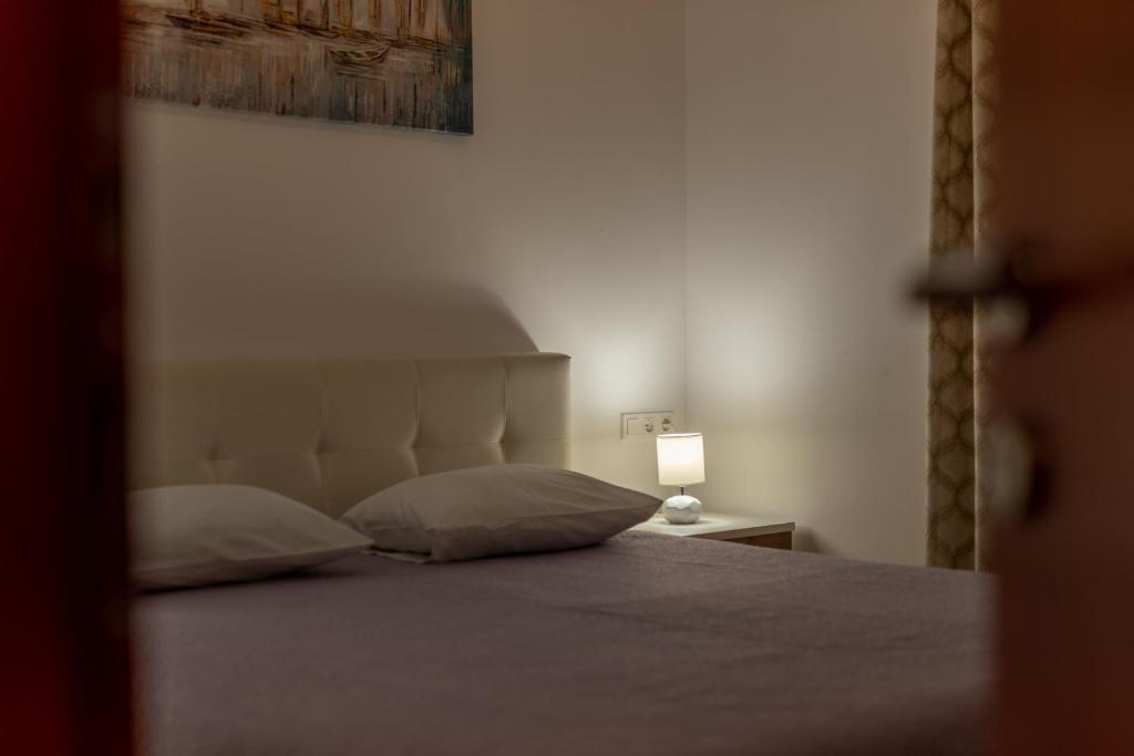 Posteľ alebo postele v izbe v ubytovaní Apartman Paty&Inky