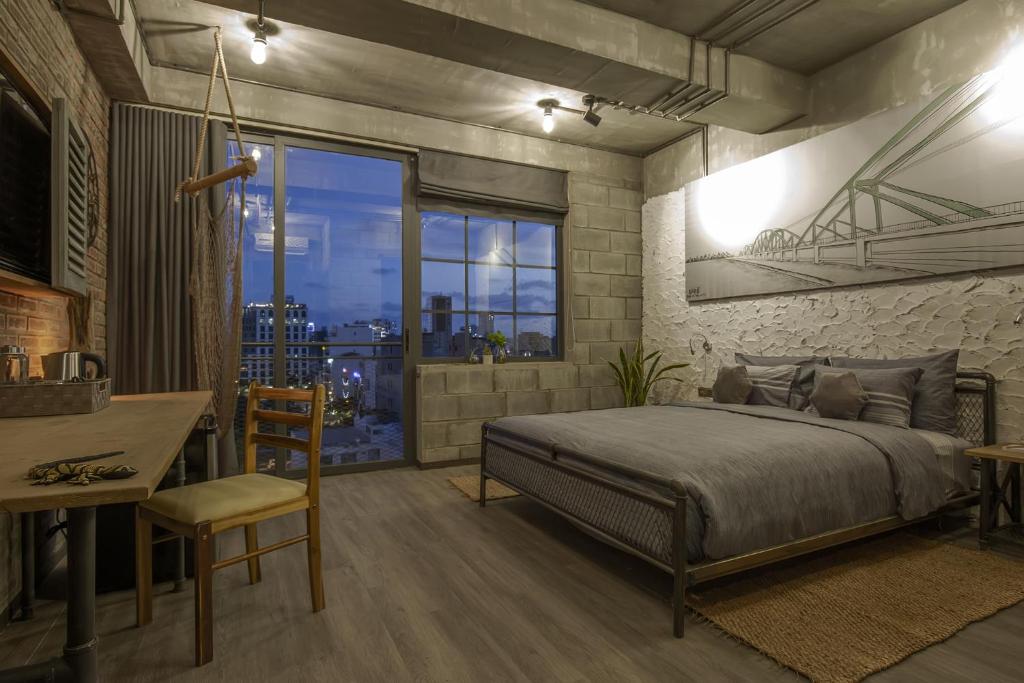 Posezení v ubytování Bridges Danang Boutique Hotel