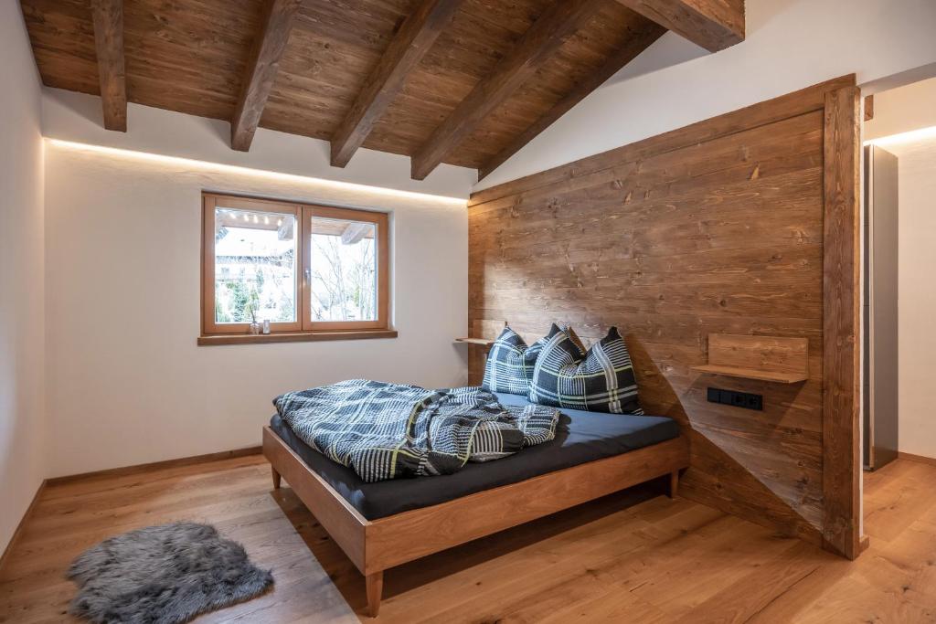 Letto o letti in una camera di Alpenchalet "DAHOAM"