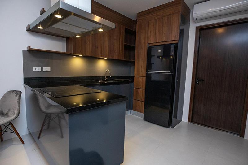 Kuchyň nebo kuchyňský kout v ubytování Beachfront Condo Escape 243