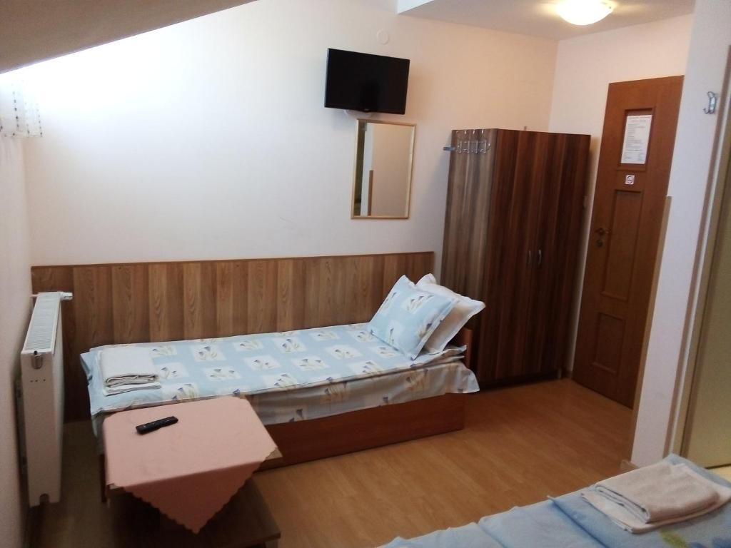 Postel nebo postele na pokoji v ubytování Aleks Guest House