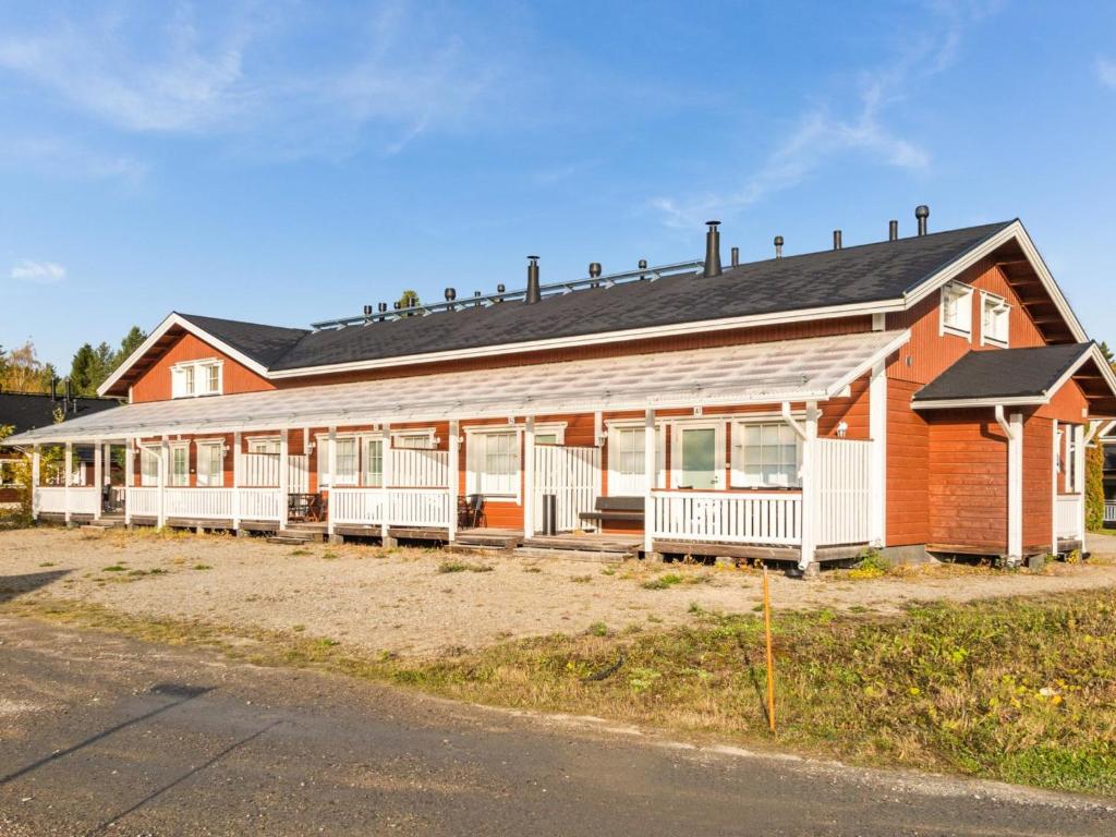 a large building with a lot of windows at Holiday Home Karitahko a 6 by Interhome in Tahkovuori