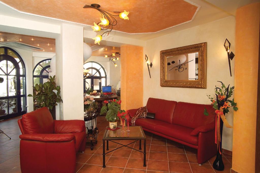 Posezení v ubytování Cleo´s Hotel Kallstadt