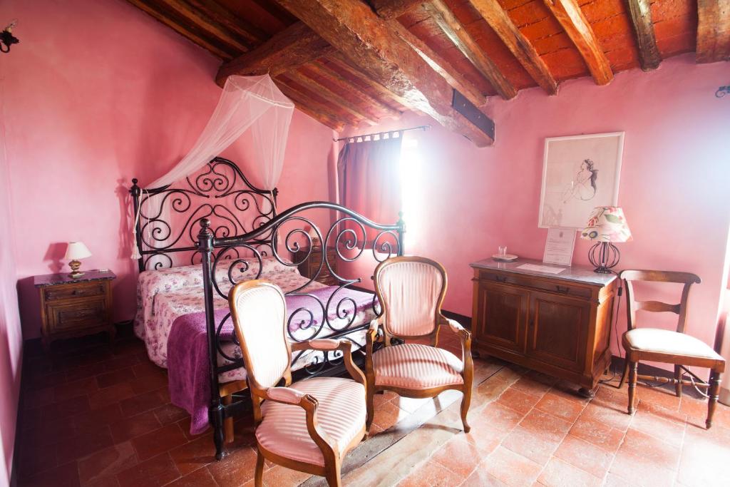 Postel nebo postele na pokoji v ubytování Relais I Castagnoni