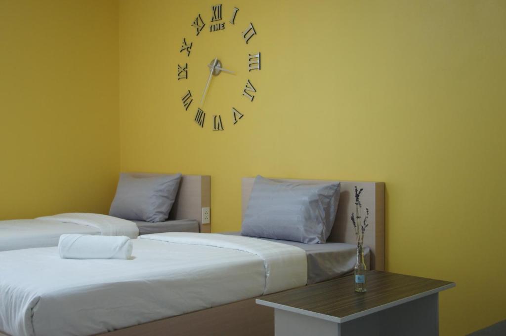 Postel nebo postele na pokoji v ubytování H12, The Stylish Apartment