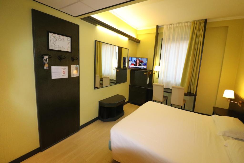 TV a/nebo společenská místnost v ubytování Hotel Domenichino