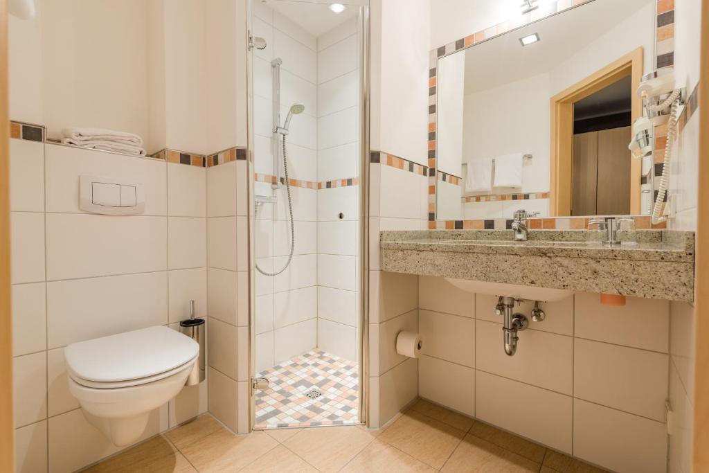 Koupelna v ubytování Hotel am Fischerhafen