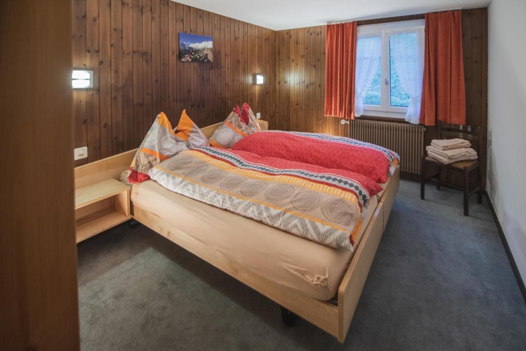 Postel nebo postele na pokoji v ubytování Chalet Alpenruh