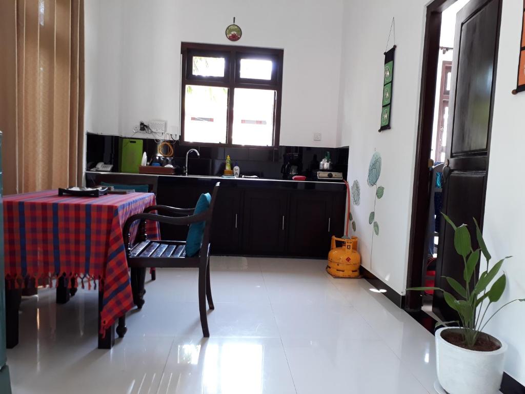 Kuchyň nebo kuchyňský kout v ubytování Apna Homestay Apartments
